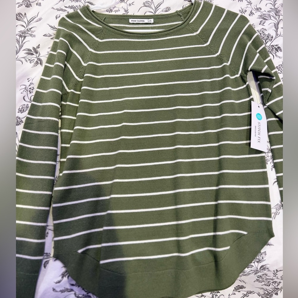 this is a olive green striped sweater/long sleeve!